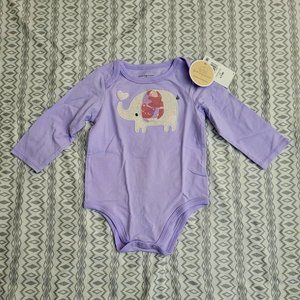 85. First Impressions one piece bodysuit. 6 - 9 months. NWT